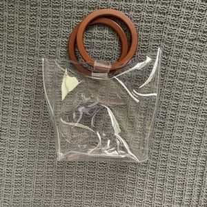 Clear tote bag with wooden handle